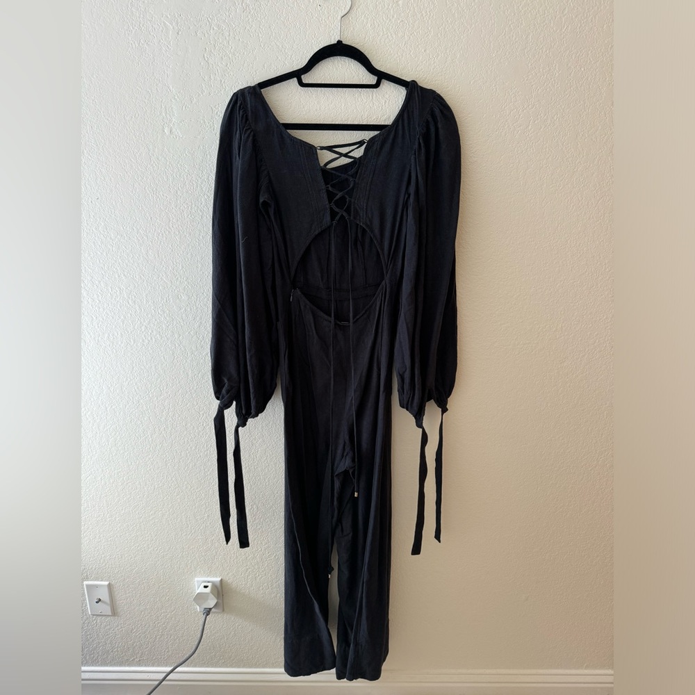 Free people faded black wide leg open back jumper size 4